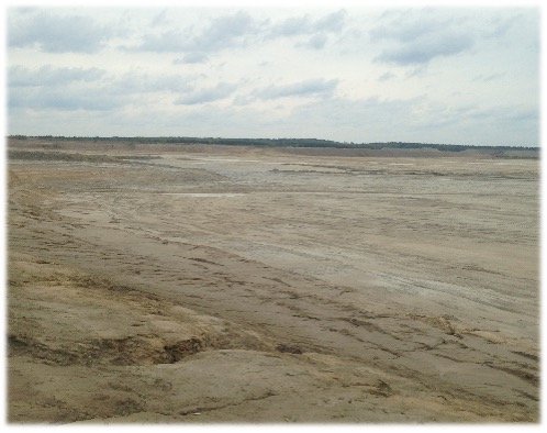 Dry tailings. Looks like an empty field