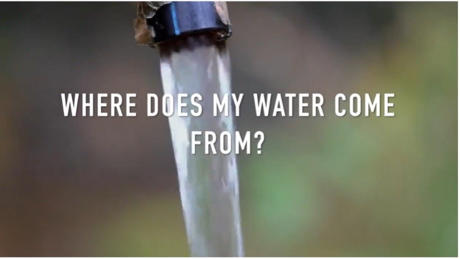 Thumbnail image of a video. The background photo shows a water tap with flowing water. Text overtop reads: "Where does my water come from?"