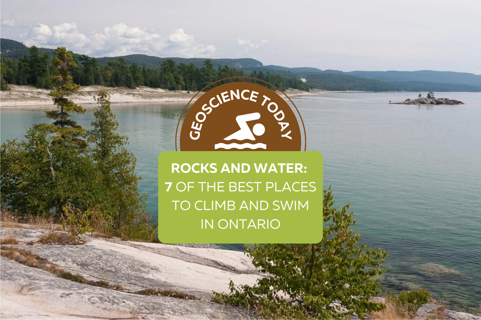 A landscape view of the coast of Lake Superior. Evergreen trees on light coloured rock are in the foreground, with the blue-green water in the background. In this distance Bathtub Island can be seen. Text overtop of the photo says: "Geoscience Today. Rocks and Water: 8 of the best places to climb and swim in Ontario"