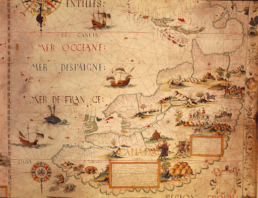 A map from 1550 showing North America. The land is filled with drawings of creatures and the ocean has ships and sea creatures in it.