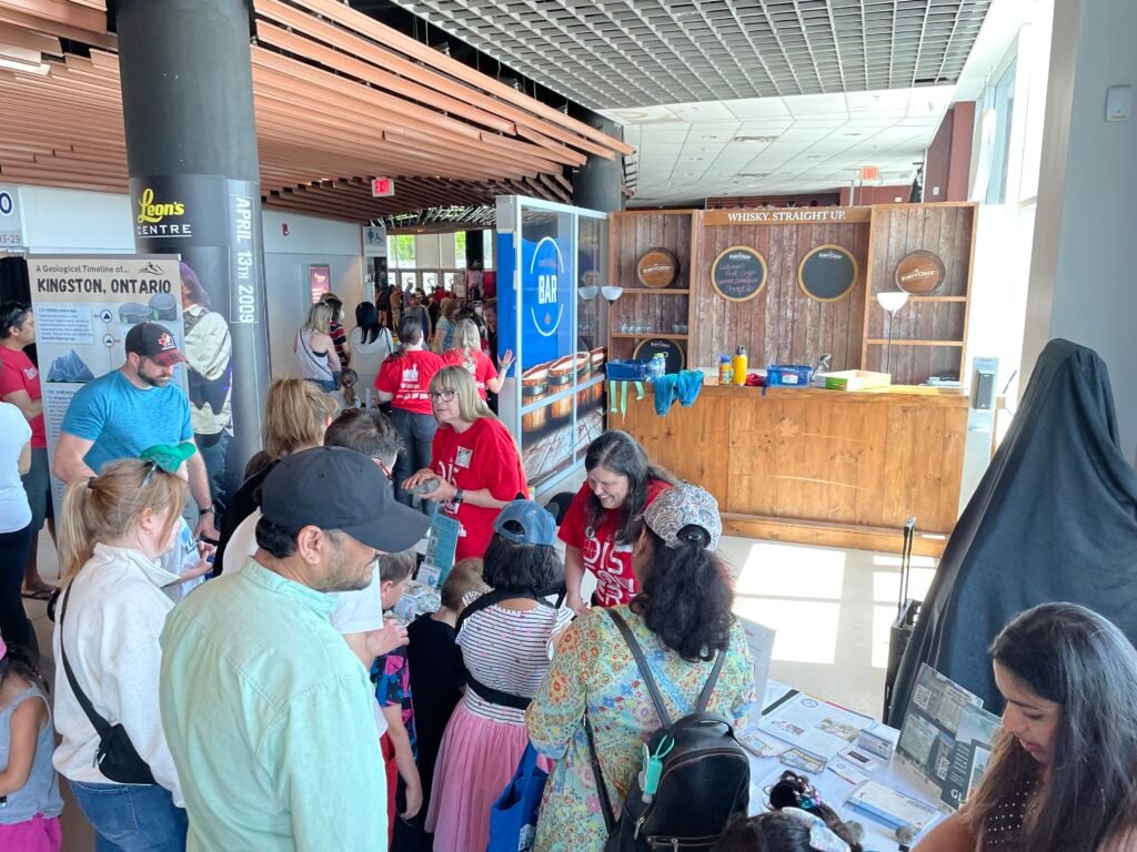 A crowd of people around our table at Science Rendezvous.