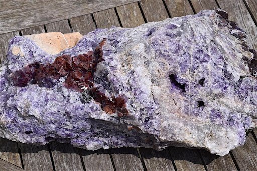 Close up view of a purple amethyst raw gem 